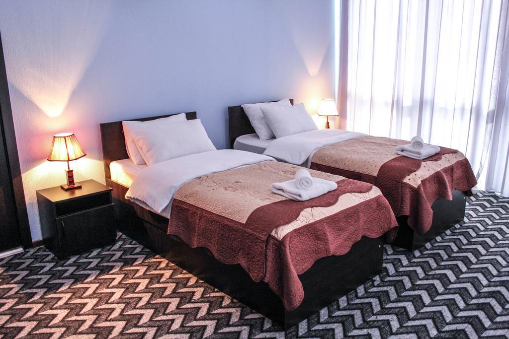 Hotel Royal Georgia Tiflis Habitación foto