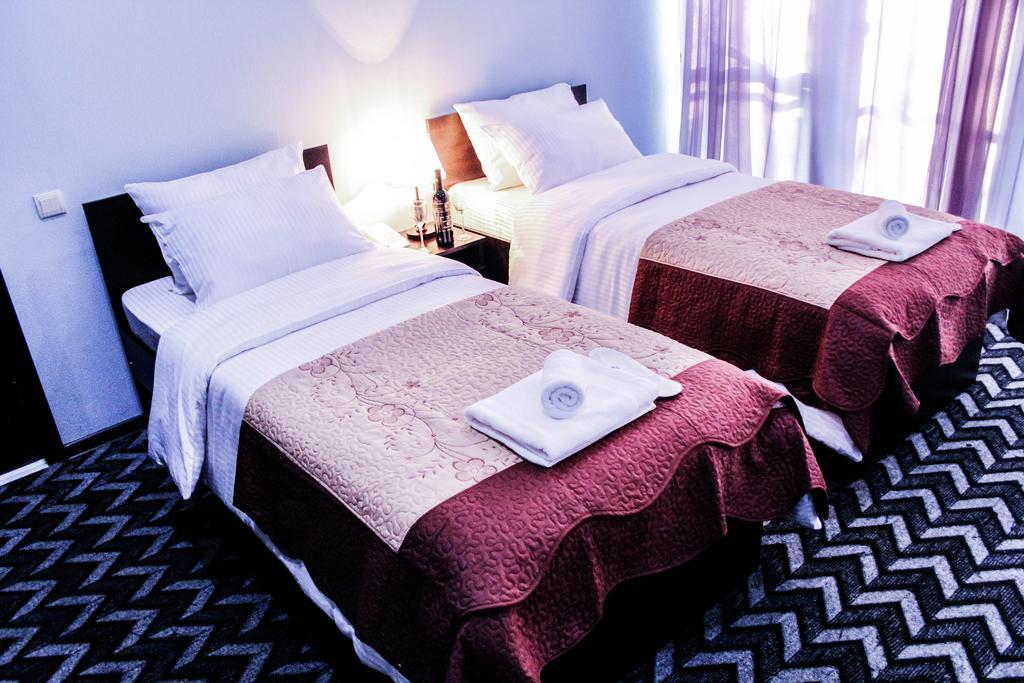 Hotel Royal Georgia Tiflis Habitación foto