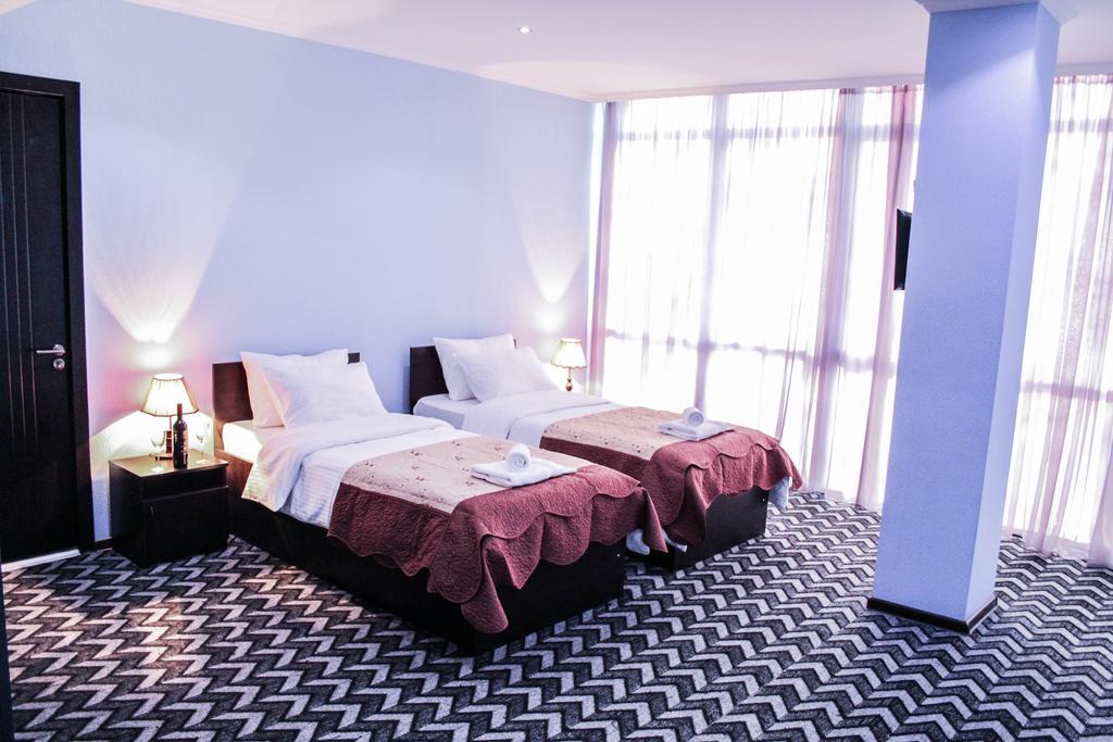 Hotel Royal Georgia Tiflis Habitación foto